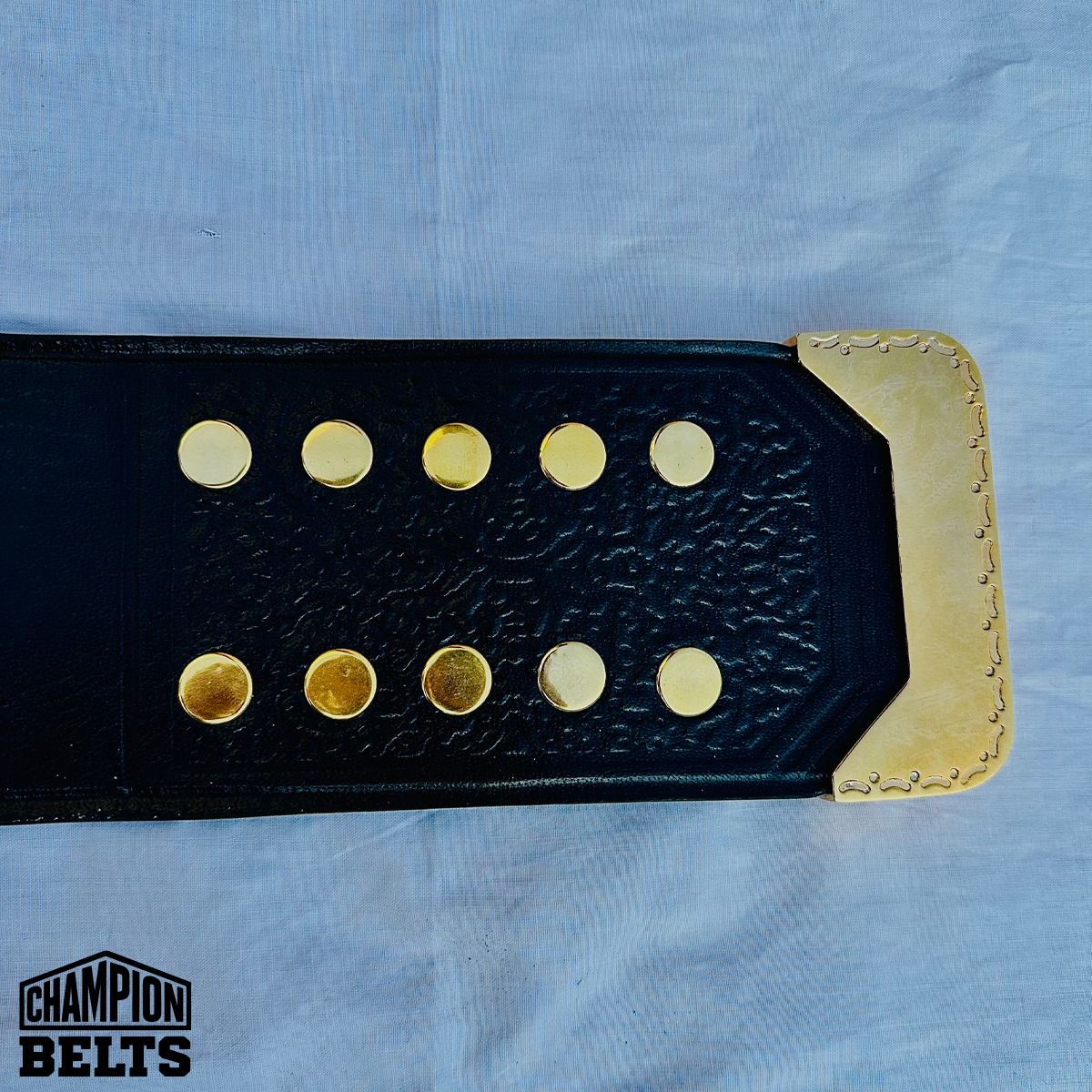 Black bowling championship belt strap with gold-tone fastening hardware and adjustable snap closure