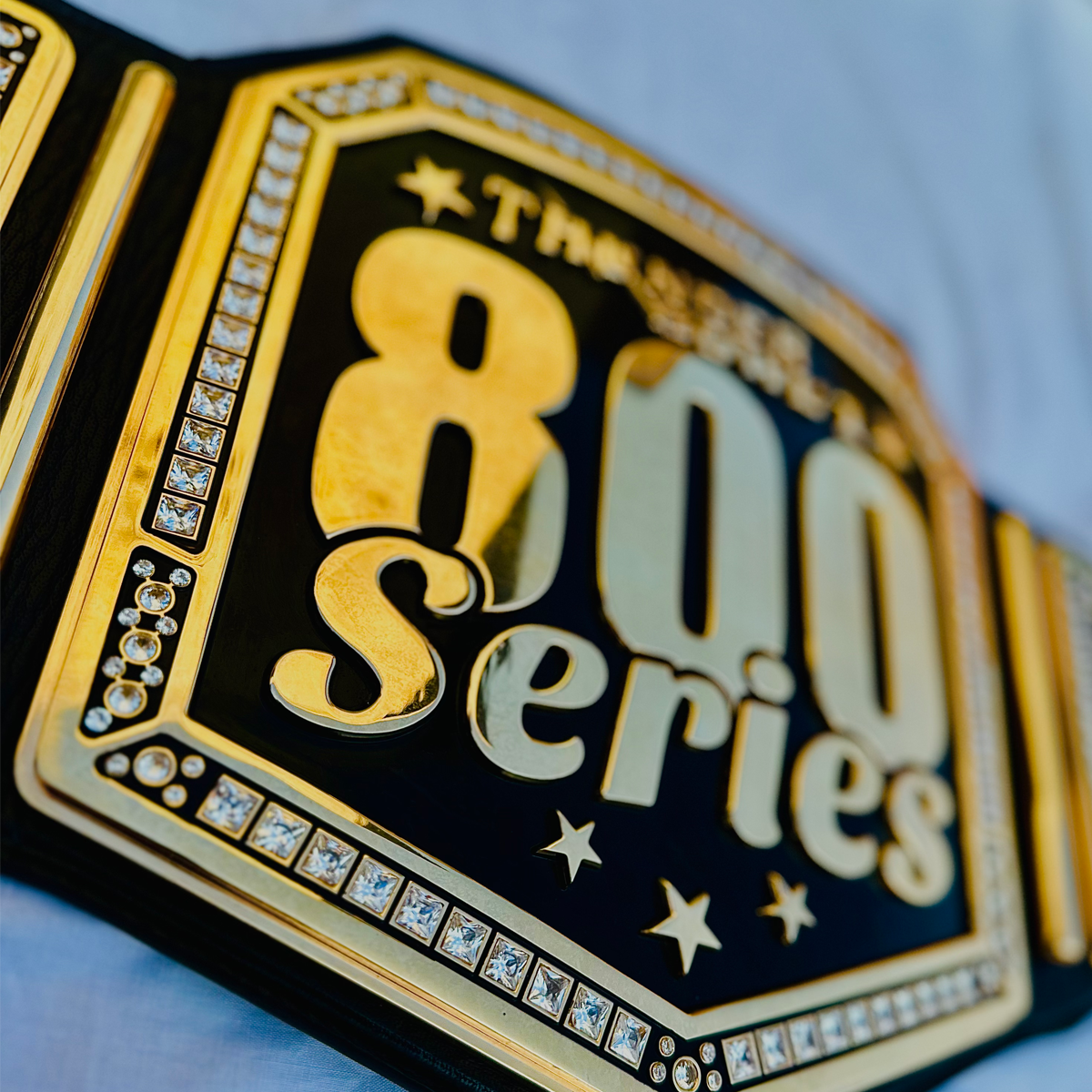 Custom bowling championship belt design showing customizable plate areas for logos, names, numbers, text, and graphics