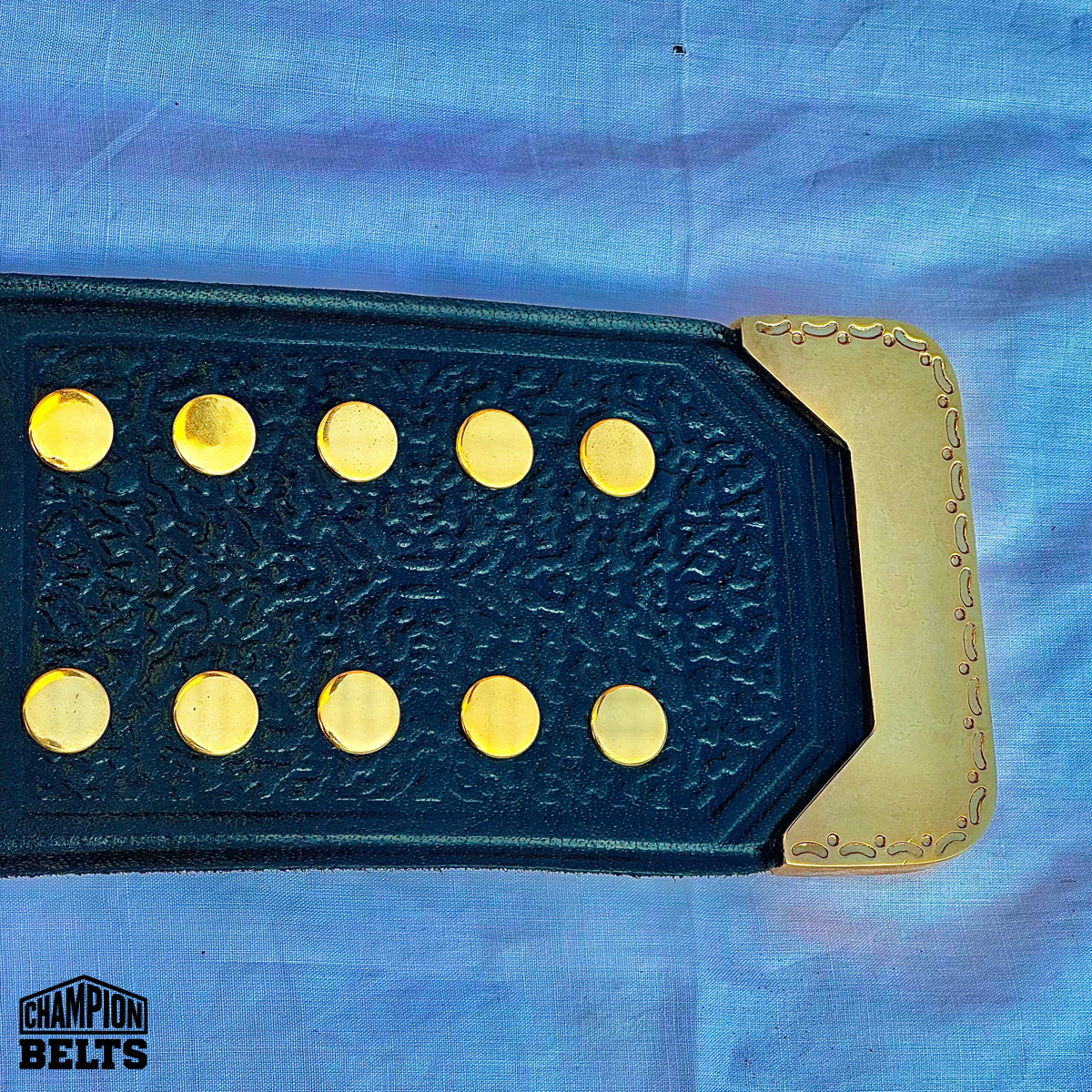 Custom Splatfest championship belt with black strap, gold fastening hardware, and adjustable snap closure