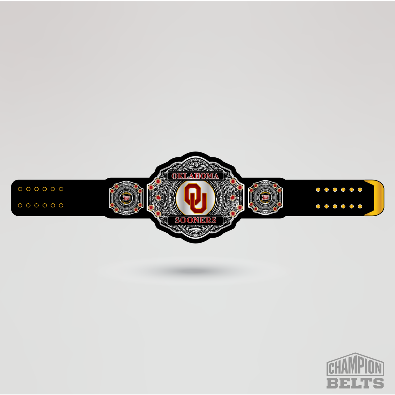 Oklahoma Sooners championship belt with black strap, silver plates, crimson accents, and OU logo centerpiece