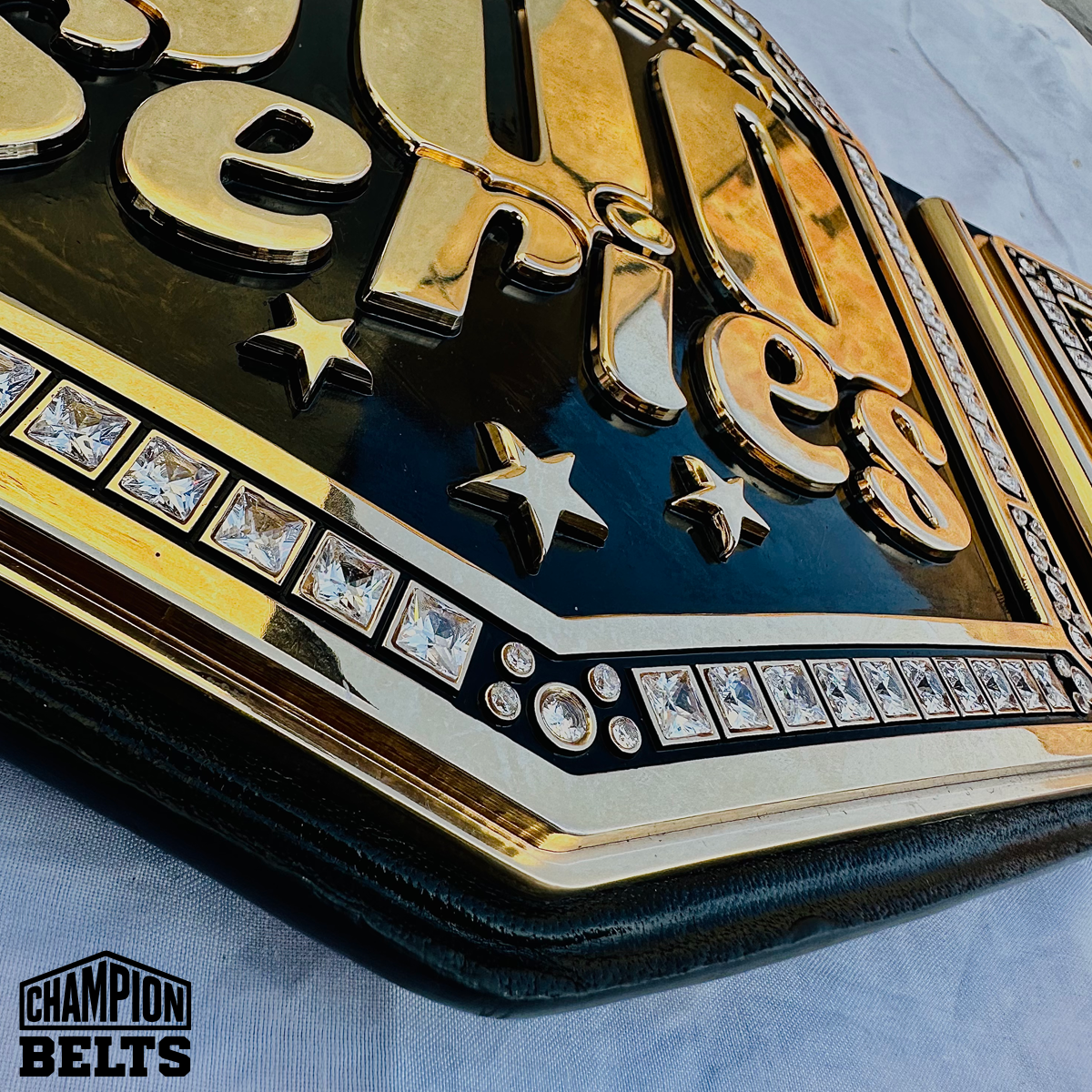 Thunder Bowl 1 800 Series bowling championship belt with black strap, gold-tone plates, stars, raised lettering, and crystal-style details